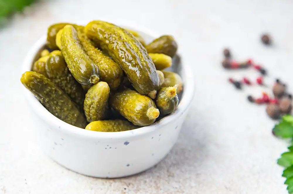 Jogue June – A Tangy Revolution in Food & Beverage A bowl of pickles.